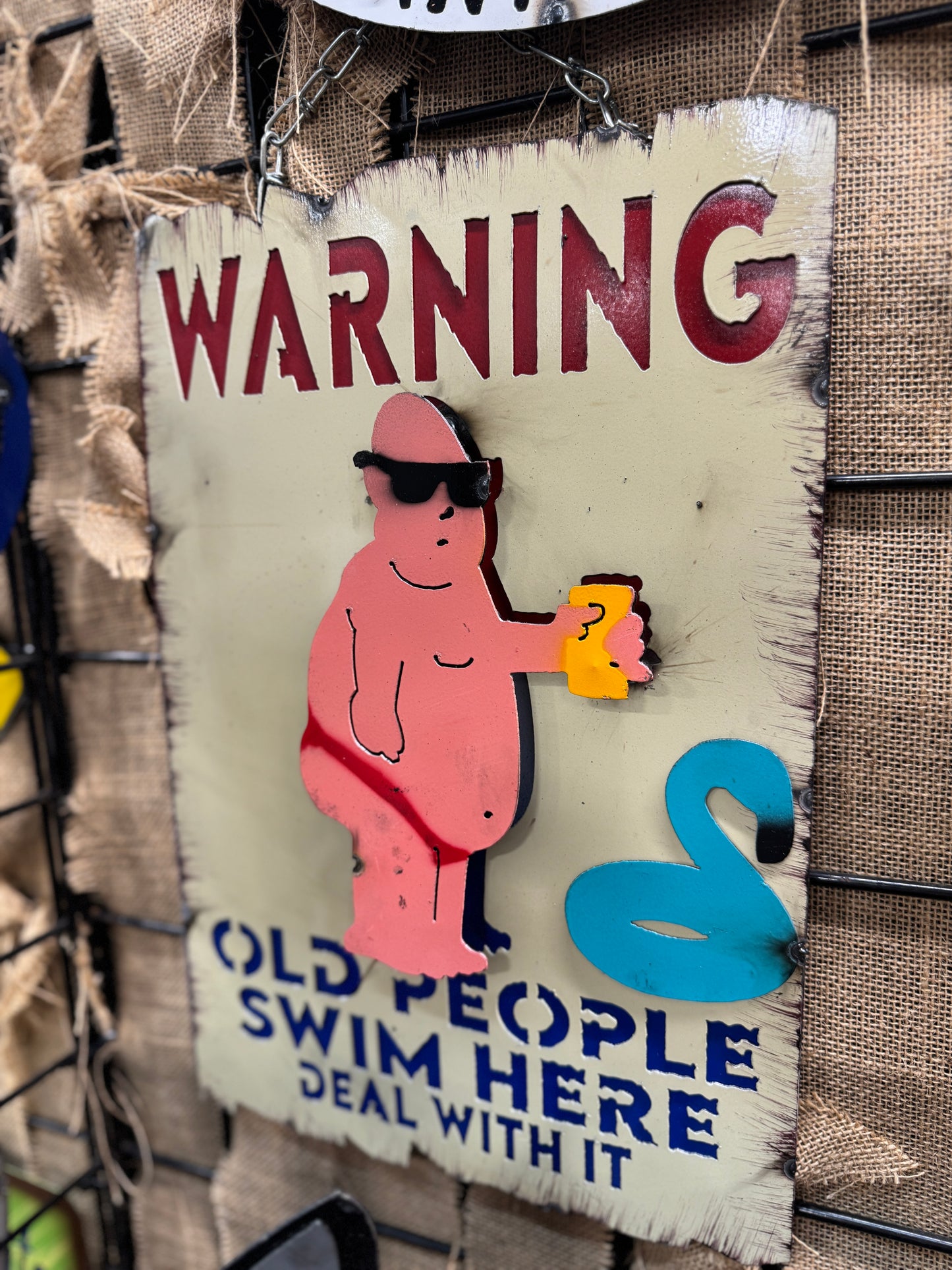 Old People Swim Here Sign