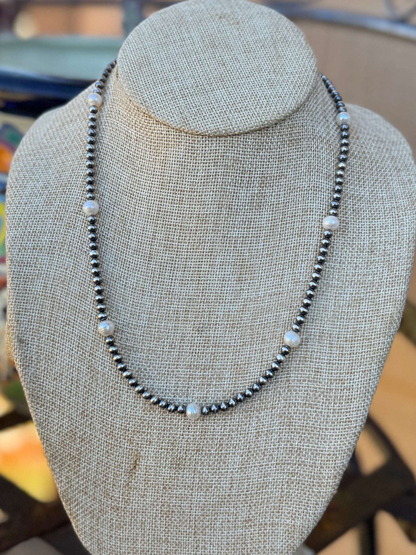 {The Pearl} Necklace