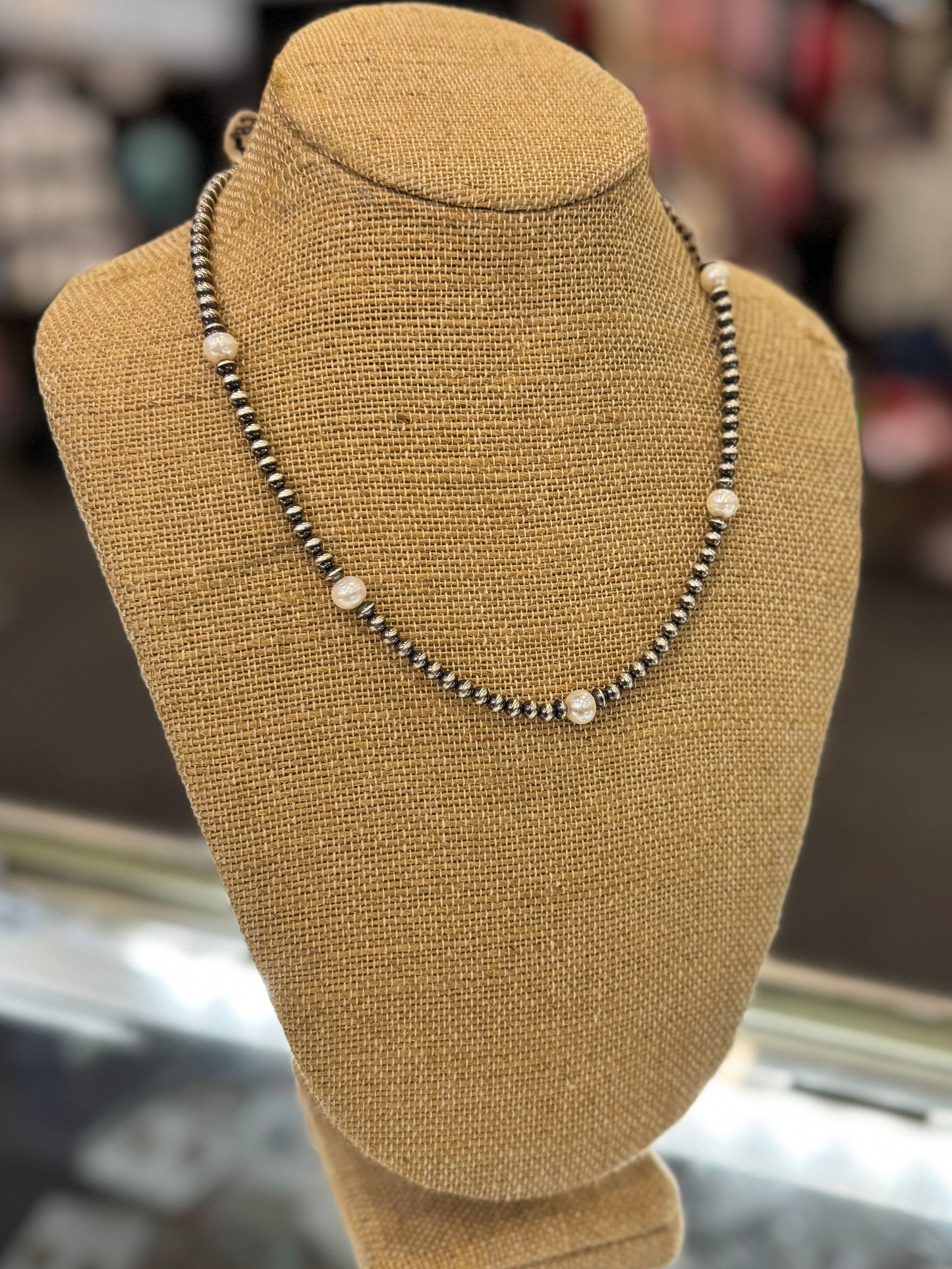 {The Pearl} Necklace