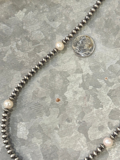 {The Pearl} Necklace
