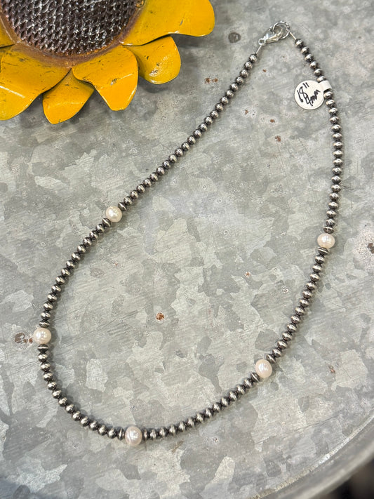 {The Pearl} Necklace