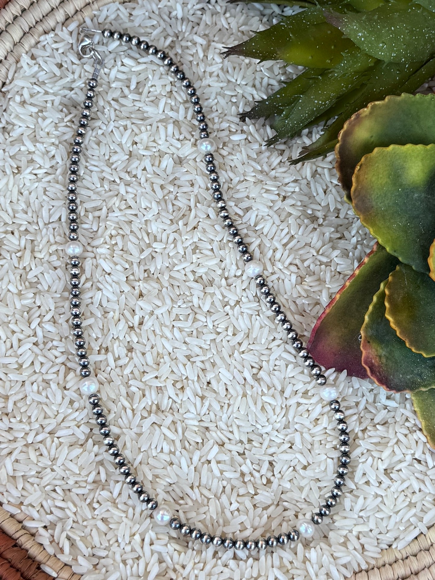 {The Pearl} Necklace