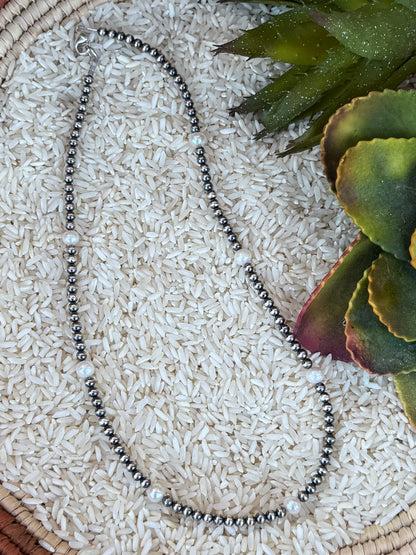 {The Pearl} Necklace