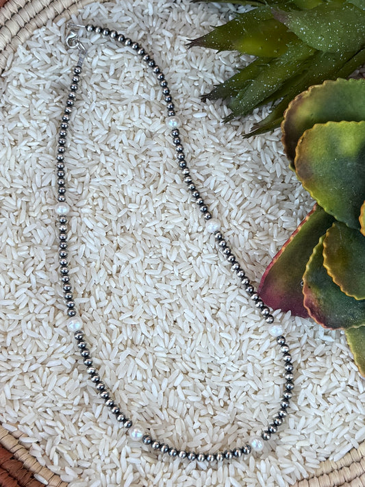 {The Pearl} Necklace